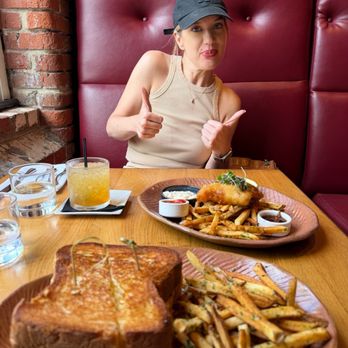Tandem - Foreground: grilled cheese with fries. Background: fish and chips Cocktail: Rose Parade - New American Near Me - Carrboro, North Carolina Tandem - Foreground: grilled cheese with fries. Background: fish and chips Cocktail: Rose Parade - New American Near Me - Carrboro, North Carolina