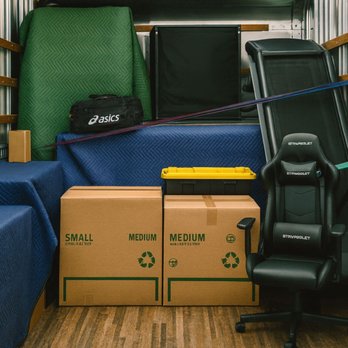 Fast Track Movers - Furniture, boxes, and valuable household items are secured inside a moving truck using protective blankets and tie-down strap... - Movers Near Me - Fresno, California Fast Track Movers - Furniture, boxes, and valuable household items are secured inside a moving truck using protective blankets and tie-down strap... - Movers Near Me - Fresno, California