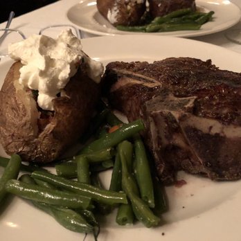 Hy's Steak House - T-bone with dressed baked potato - Steakhouses Near Me - Honolulu, Hawaii Hy's Steak House - T-bone with dressed baked potato - Steakhouses Near Me - Honolulu, Hawaii