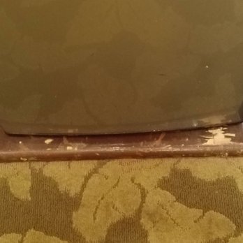 Humphreys Half Moon Inn - Old wood stand showing chipped wood - San Diego, CA
