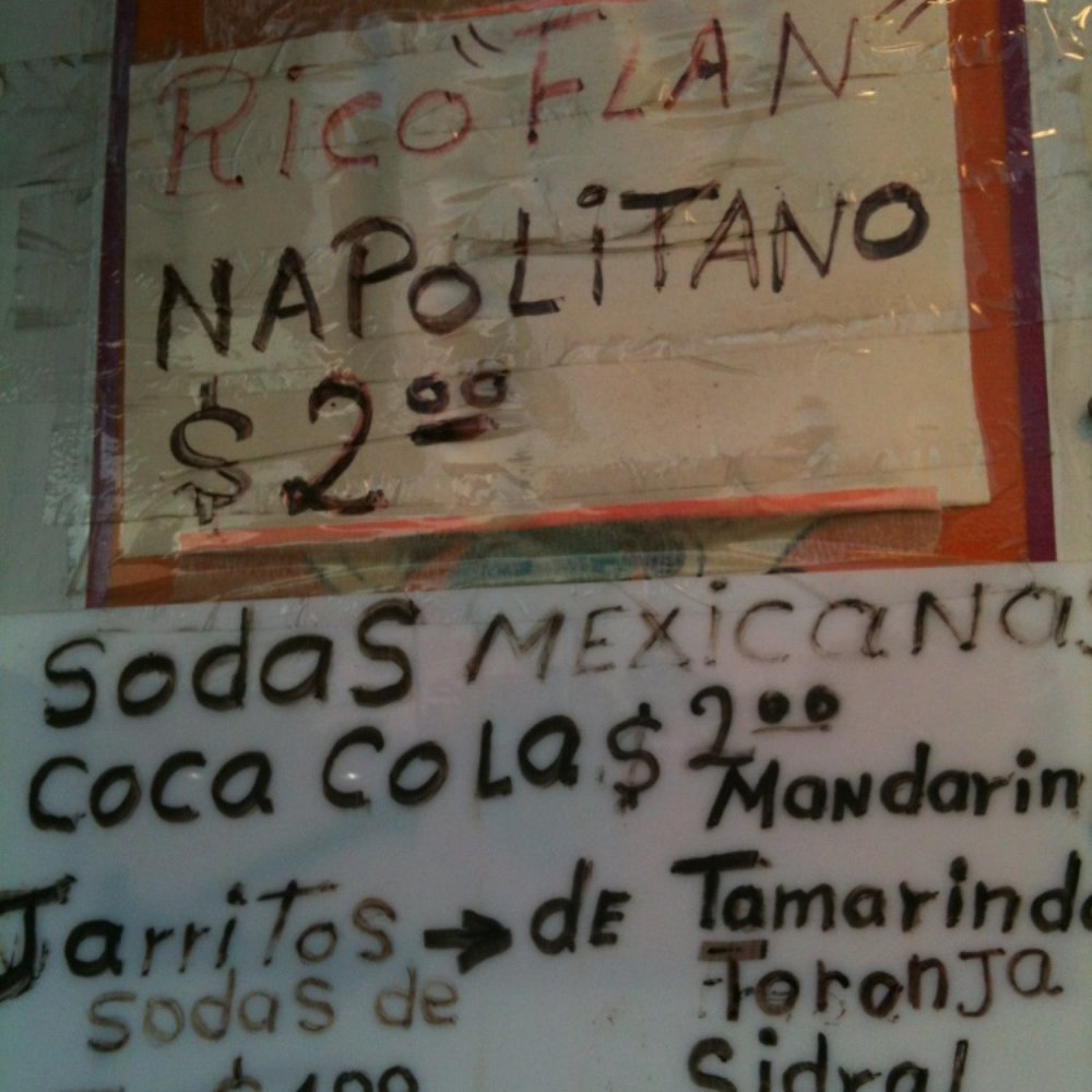 Taqueria Gigante - a sign for a mexican restaurant - Street Vendors Near Me - Austin, Texas
