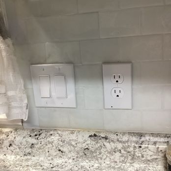 McNamee Electric - Example of plug and switches replaced - Electricians Near Me