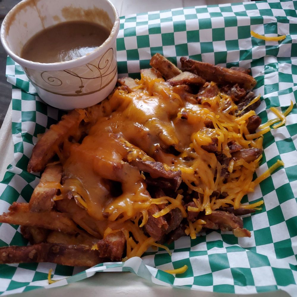 The Pony - Cheese fries, gravy on side - Chicken Wings Near Me - Cincinnati, Ohio The Pony - Cheese fries, gravy on side - Chicken Wings Near Me - Cincinnati, Ohio