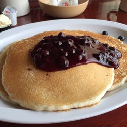 Blueberry pancakes with blueberry sauce