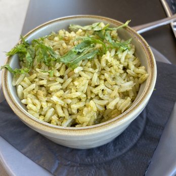Conejo - Arroz verde.  (Green rice.)  Nothing spectacular, but a good side dish with nice flavor.  [GF] - Mexican Near Me - Richmond, Virginia