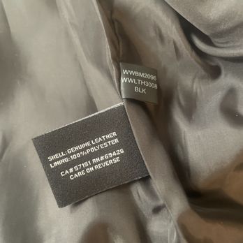 Wilson Leather - It says it is leather right here, but I've never seen leather peel off from a sticker like this - Leather Goods Near Me - Lake Arrowhead, California