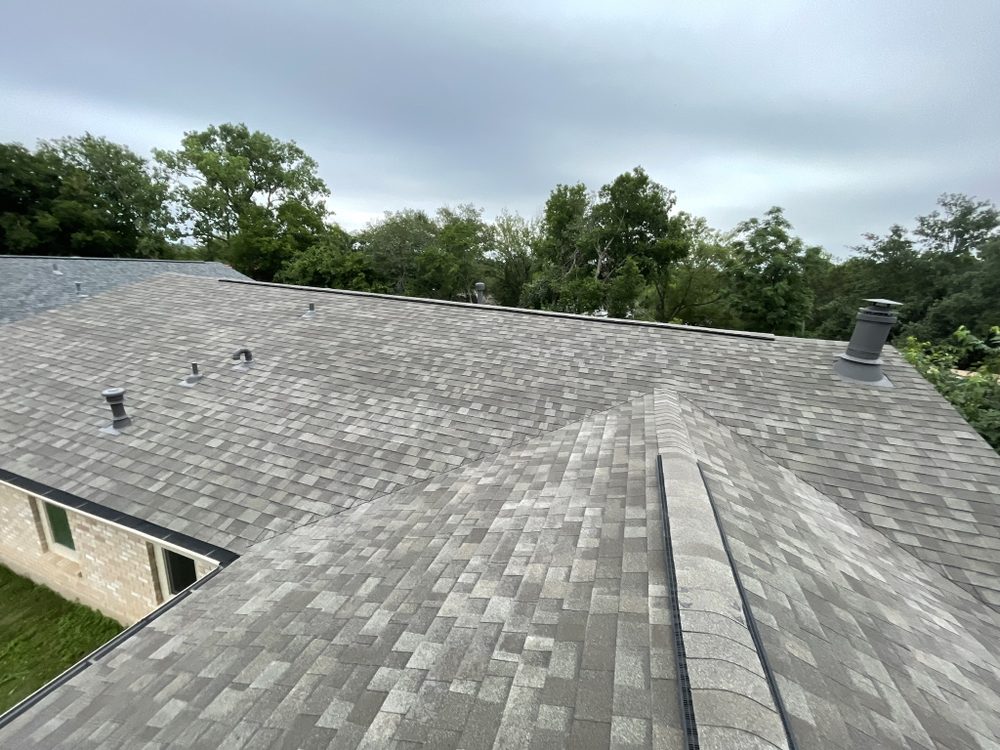 Slide of Stallion Roofing Company