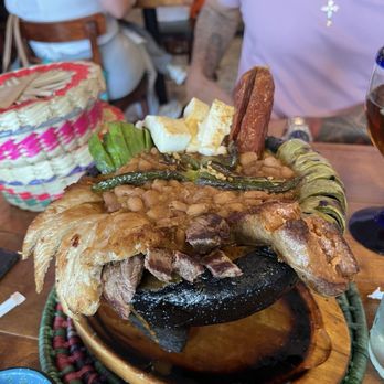 La Reyna - Authentic Mexican Cuisine - Mix Molcajete Mixed (Arrachera Steak & Chicken) - Large enough for 2 people. - Mexican Near Me - Cooper City, Florida La Reyna - Authentic Mexican Cuisine - Mix Molcajete Mixed (Arrachera Steak & Chicken) - Large enough for 2 people. - Mexican Near Me - Cooper City, Florida