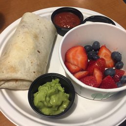 Breakfast burrito with fruit bowl