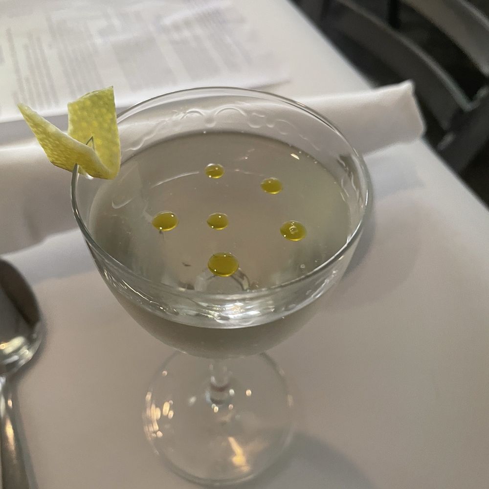 Bari Ristorante - Not sure the exact name but it's a martini with basil oil.  Loved it - Italian Near Me - Memphis, Tennessee
