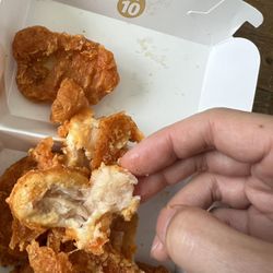 McDonald's - Raw chicken inside the spicy nuggets