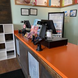 Clean countertop and bright colors throughout