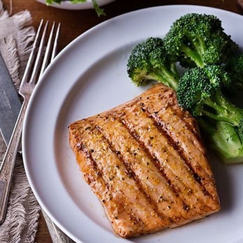 Logan's Roadhouse - Mesquite Wood-Grilled Salmon - Served with a garlic-dill sauce. - Steakhouses Near Me - Redding, California