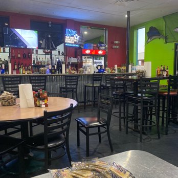 Fish N Tails Oyster Bar - tables and chairs - Seafood Near Me - Richardson, Texas Fish N Tails Oyster Bar - tables and chairs - Seafood Near Me - Richardson, Texas