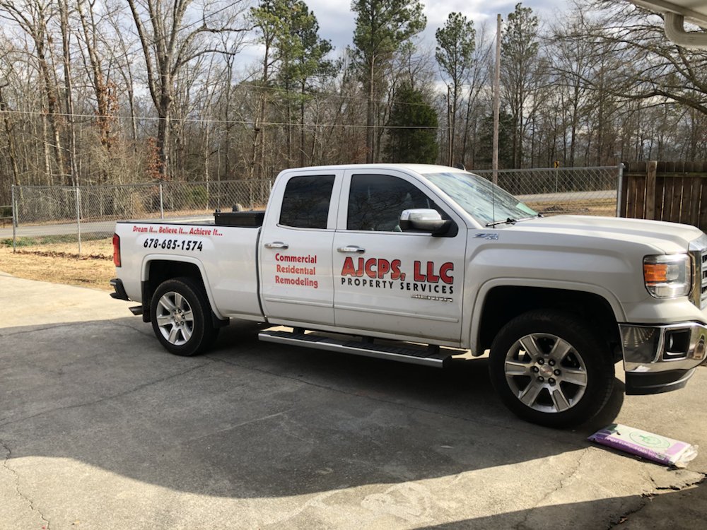 Slide of AJC property services