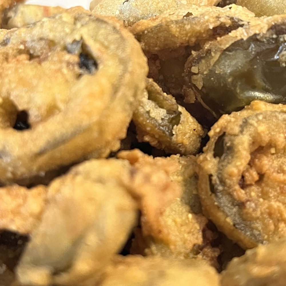 Space Burger - a pile of fried onion rings - Burgers Near Me - Irving, Texas Space Burger - a pile of fried onion rings - Burgers Near Me - Irving, Texas
