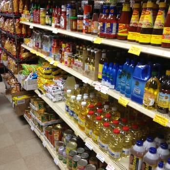 India House - a woman shopping in a grocery store - International Grocery Near Me - Madison, Wisconsin India House - a woman shopping in a grocery store - International Grocery Near Me - Madison, Wisconsin