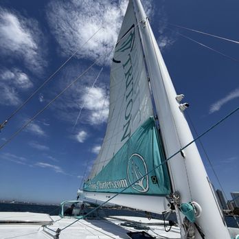 Triton Charters - Putting up the sail! - Boating Near Me - San Diego, California Triton Charters - Putting up the sail! - Boating Near Me - San Diego, California