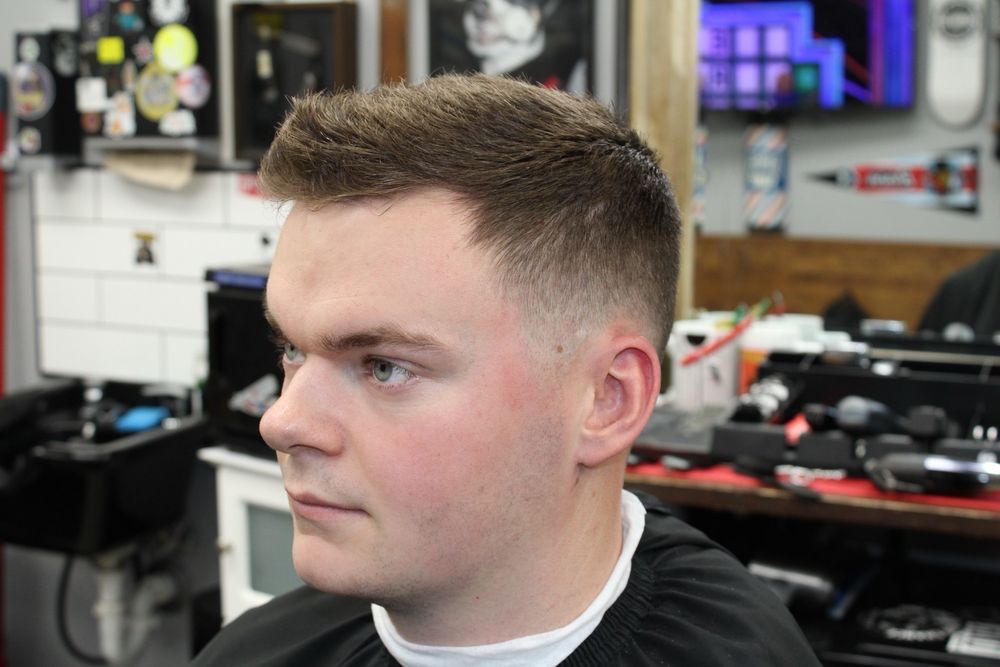 Downtown Ollie's Barber Parlour Logo