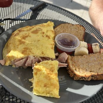 Paradise Bagels Cafe - Omelette with ham and cheese. The picture does not do it justice. This thing was HUGE! - New American Near Me - Holmes Beach, Florida