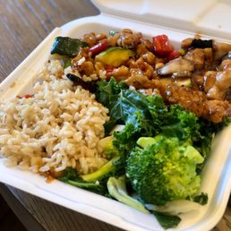Kung Pao & Mushroom Chicken plate with brown steamed rice and power greens Kung Pao & Mushroom Chicken plate with brown steamed rice and power greens