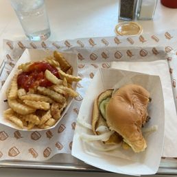 Double cheeseburger. They said it started as a 5oz patty but my double needed up like a 6 oz burger. Small but served hot and flavorful Double cheeseburger. They said it started as a 5oz patty but my double needed up like a 6 oz burger. Small but served hot and flavorful