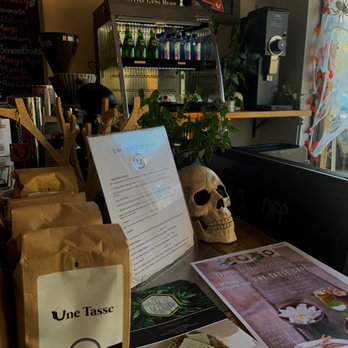 Une Tasse Cafe - a bag of coffee on a table - Coffee & Tea Near Me - Bayonne, New Jersey Une Tasse Cafe - a bag of coffee on a table - Coffee & Tea Near Me - Bayonne, New Jersey