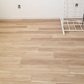 Custom Measures Construction - Relaid out LVF in upstairs bedrooms and joining hallway. Wonderful work. - Flooring Near Me