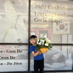 Bloomingdale Florist - White floral arrangement for a heavenly birthday.