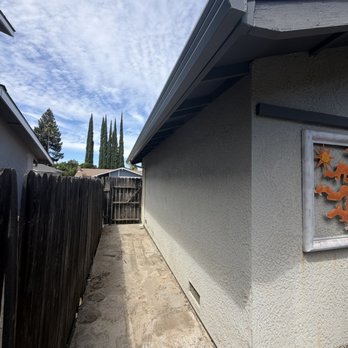 Twins Gutters - Newly installed gutter with downspout. Matched color to the fascia. - Gutter Services Near Me - Manteca, California Twins Gutters - Newly installed gutter with downspout. Matched color to the fascia. - Gutter Services Near Me - Manteca, California