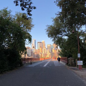 Stone Arch Bridge - View towards city from Father Hennepin Park - Landmarks & Historical Buildings Near Me - Minneapolis, Minnesota