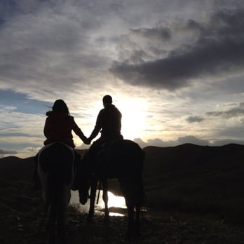 Rancho Bravo - Alejandro posed us like a pro photographer and asked us to hold hands - Horseback Riding Near Me - Hemet, California