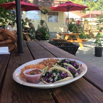 Crave - Outdoor seating area at Crave with the carne asada taco combo plate. - Barbeque Near Me - Mount Shasta, California