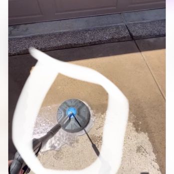 Rucker Home Detailing - Davin Cleaning my driveway and him showing me the dirt that came off my driveway - Window Washing Near Me