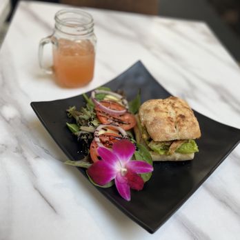One Love Cafe - Chicken Pesto with Almond Pesto and Strawberry Agua Fresca Juice. - Coffee & Tea Near Me - San Bruno, California One Love Cafe - Chicken Pesto with Almond Pesto and Strawberry Agua Fresca Juice. - Coffee & Tea Near Me - San Bruno, California