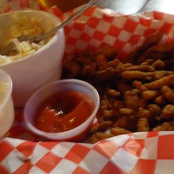 The Filling Station - These little rolled-up burnt pieces of hard, fried breadcrumbs sold as "clam basket". No trace of any clam material.