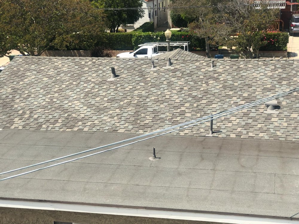 Slide of Santiagos Roofing