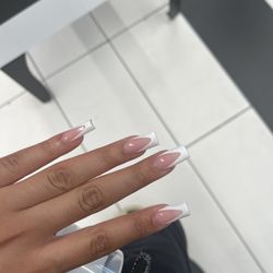 Escape Salon & Day Spa - Perfect shape and even french.