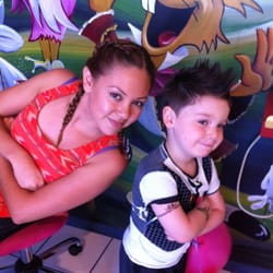 Lollicut - Stylist "Olivia" & Mr. Marley Man, after his first "real" haircut (ie not by Mom). P.S. He luvs the "spiky banana wax".