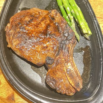 Outback Steakhouse - Ribeye steak with asparagus spears - Steakhouses Near Me - Charlotte, North Carolina Outback Steakhouse - Ribeye steak with asparagus spears - Steakhouses Near Me - Charlotte, North Carolina