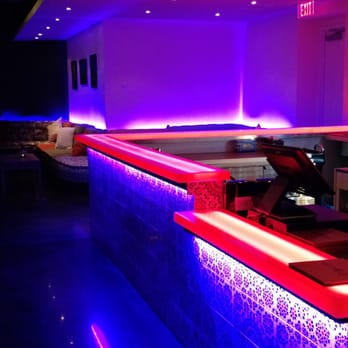 Greenhouse Kitchen + Bar - The purple's a nice touch, even at checkout. (They do have sit-down table service) - Cocktail Bars Near Me - Vienna, Virginia