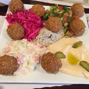 Allan's Falafel - Allan's Famous Falafel. Very crispy and delicious! This is with hummus, baba ghanoush, tahini salad, Israeli salad and red cabbage. Great! - Middle Eastern Near Me - Chester, New York