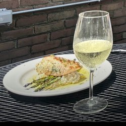 Brandywine Country Club - Perfectly prepared stuffed salmon with risotto and lemon butter sauce.