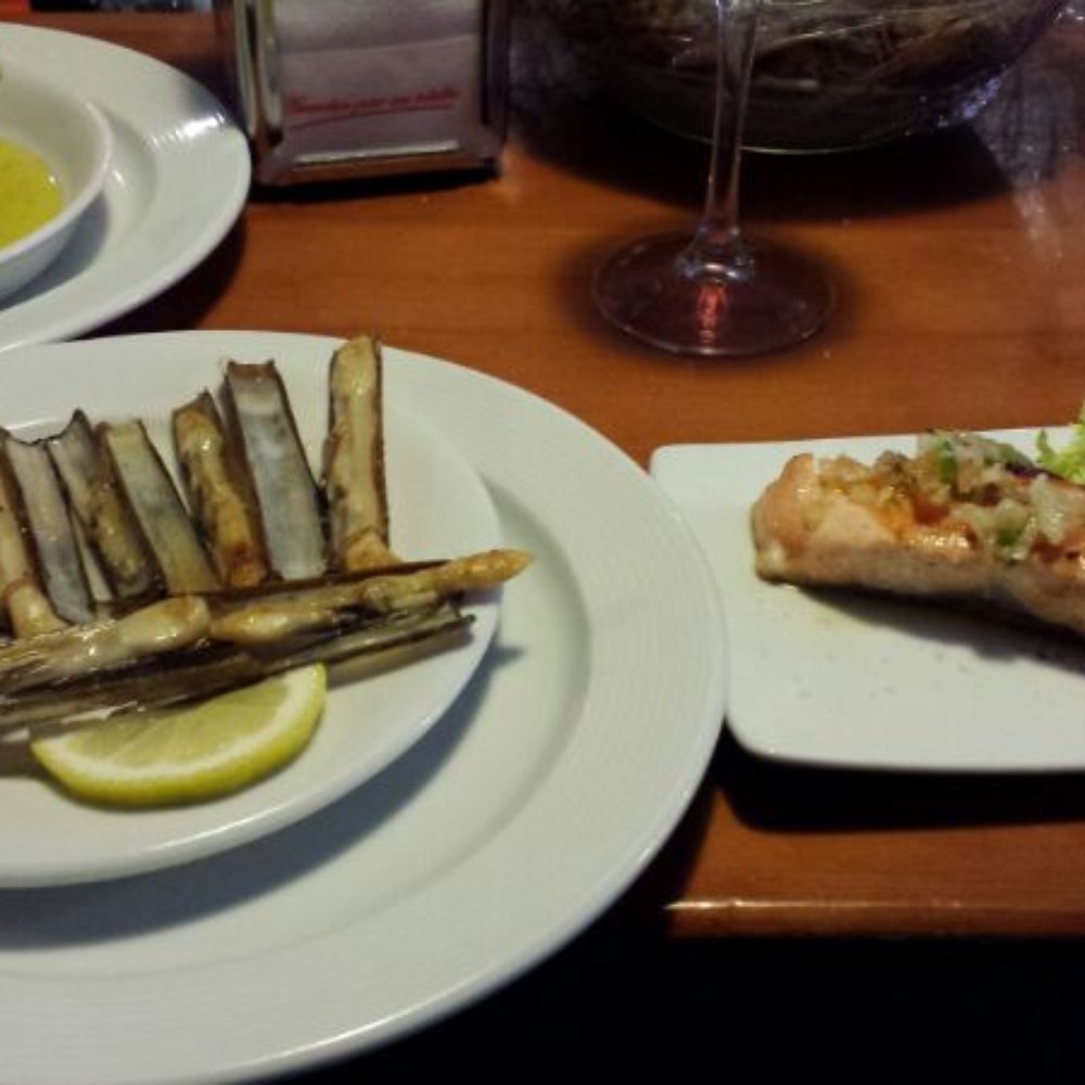 Eslava - Salmon del la plancha and sine other seafood dish... - Tapas Bars Near Me - Seville, SE