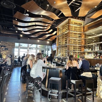 Reunion Kitchen + Drink - people sitting at a bar - New American Near Me - Corona, California