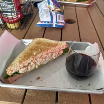 Patio Cafe - Chicken Salad with a glass of wine - Breakfast & Brunch Near Me - New Smyrna Beach, Florida Patio Cafe - Chicken Salad with a glass of wine - Breakfast & Brunch Near Me - New Smyrna Beach, Florida