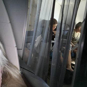 Hawaiian Airlines - extra comfort with windows open makes for a bright first class 3C seat . - Airlines Near Me - Los Angeles, California