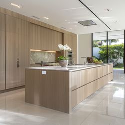 Sparkling Cleaning Services - This stunning kitchen was left spotless and refreshed--It's the kind of clean that elevates the beauty of a luxury space.