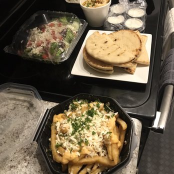 Laziza Mediterranean Grill - Evans  - Small side Feta Fries and the Sharable Chicken Shawarma meal in the back. - Middle Eastern Near Me - Evans, Georgia