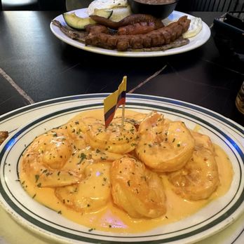 Mr Pollo Bayside - Shrimp with sauce and two sides. My man had a plate with steak sausage chicharrón w/rice and beans and avocado and sweet plantain. - Spanish Near Me - Bayside, New York Mr Pollo Bayside - Shrimp with sauce and two sides. My man had a plate with steak sausage chicharrón w/rice and beans and avocado and sweet plantain. - Spanish Near Me - Bayside, New York